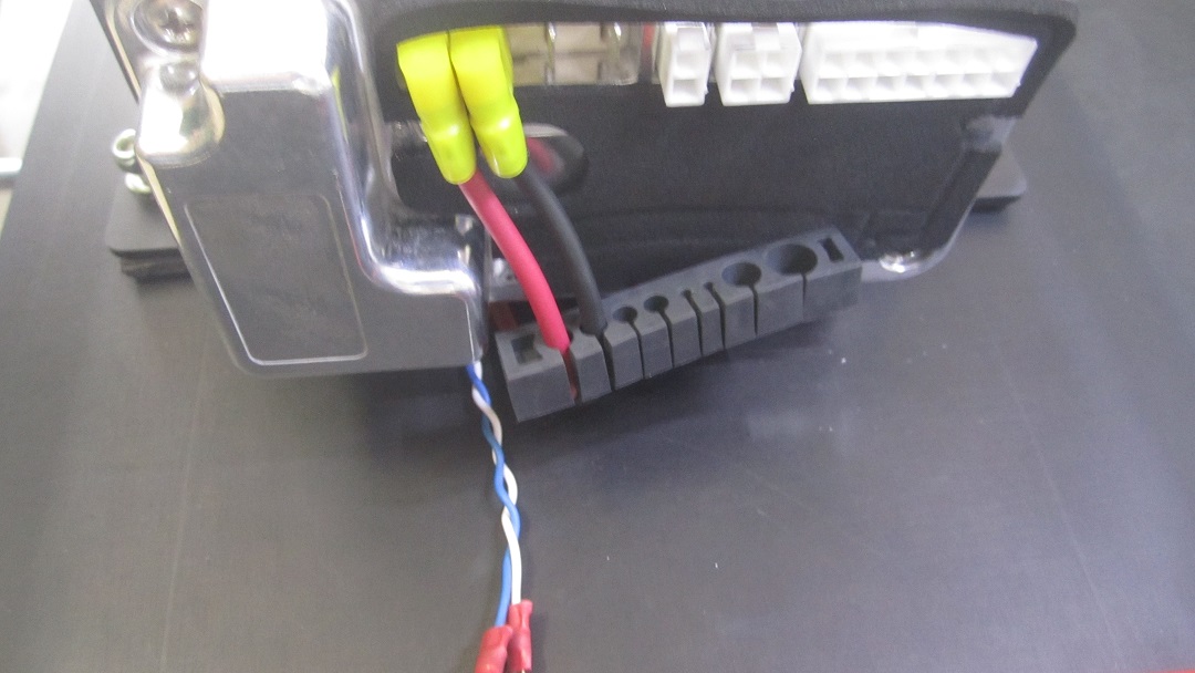 Install wire loom and black battery wire to black – connector on electronics.